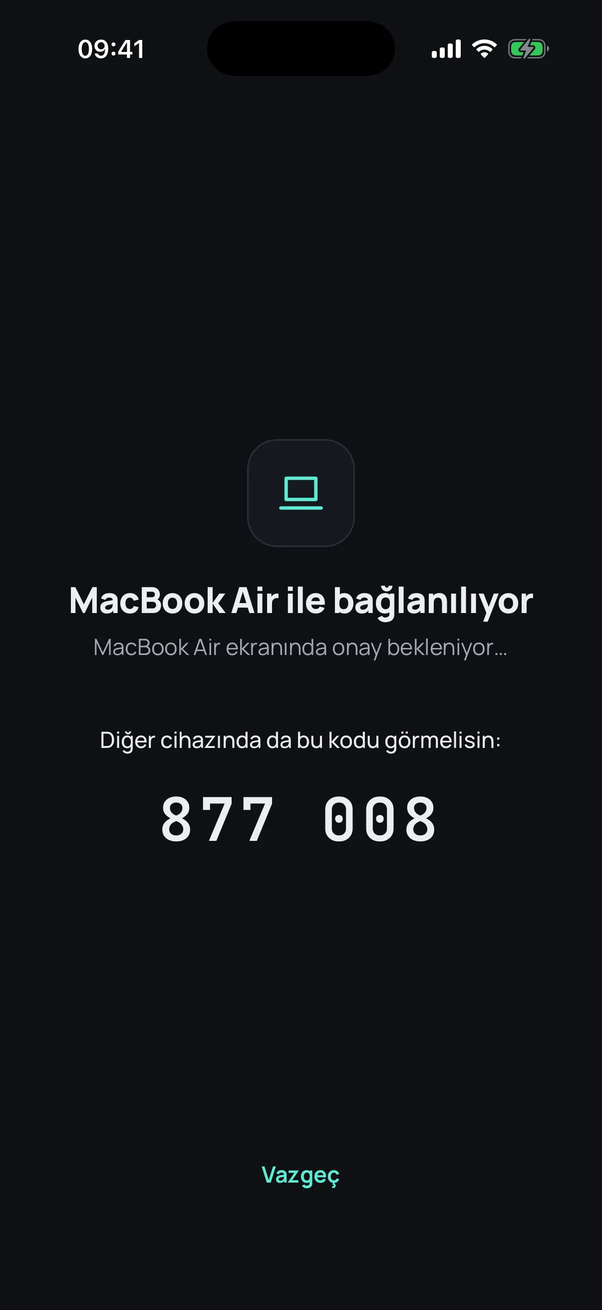The same security code, 877 008, on the iPhone, waiting for the Mac to confirm